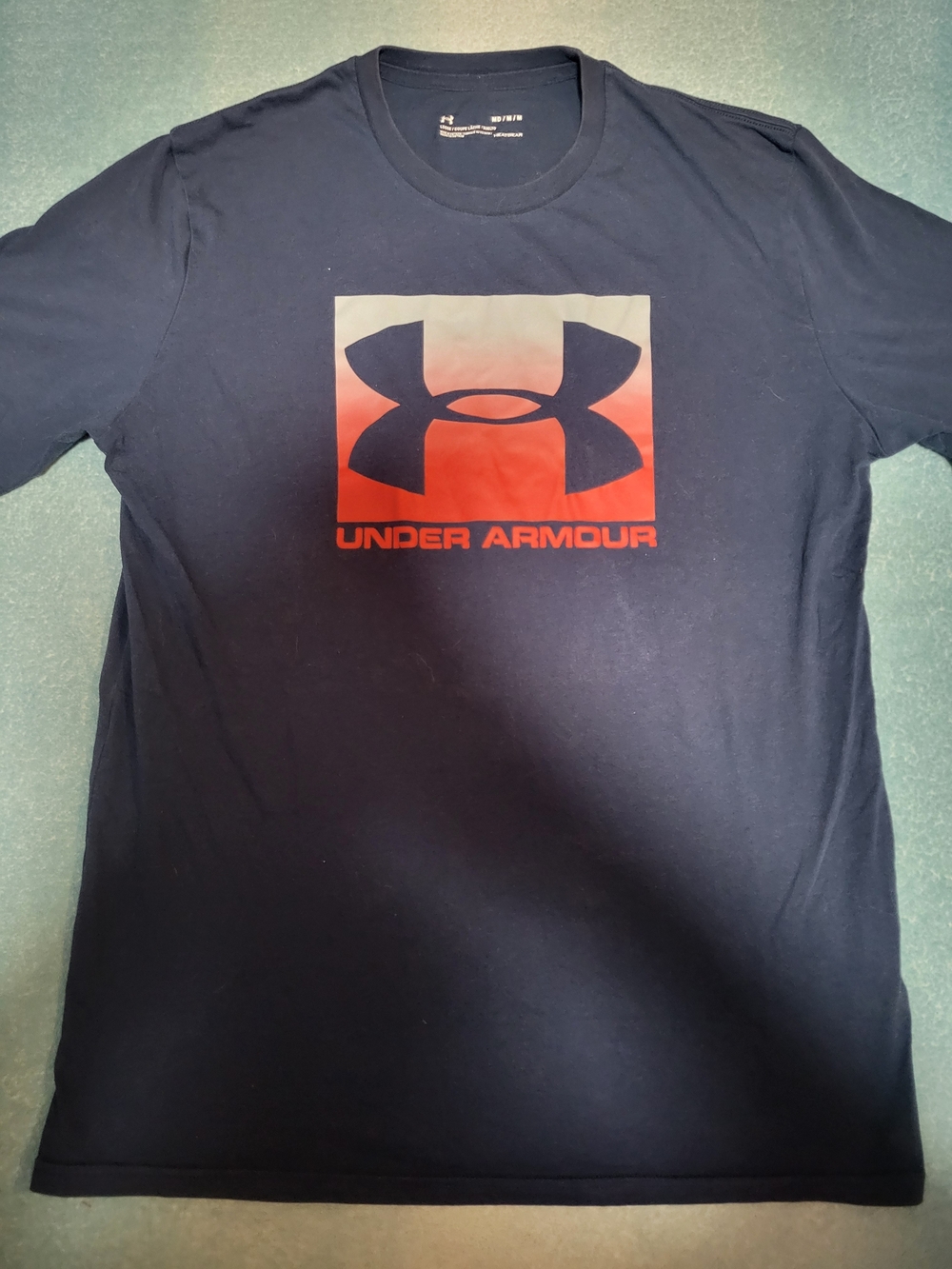 Under Armour Men’s Navy Short-Sleeve Tee with Red Logo